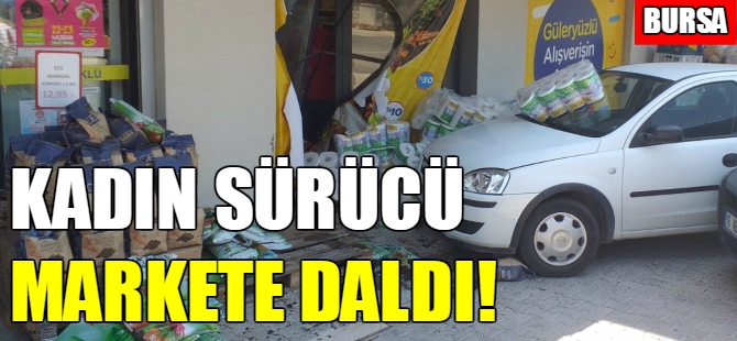 Bursa'da vitesi karıştıran kadın markete daldı