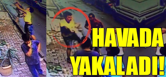 Pencereden düşen bebeği havada yakaladı