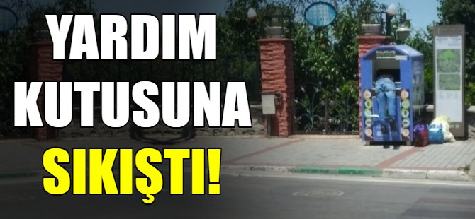 Yardım kutusuna sıkıştı!