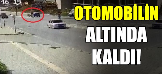 Genç kadın otomobil altında kaldı