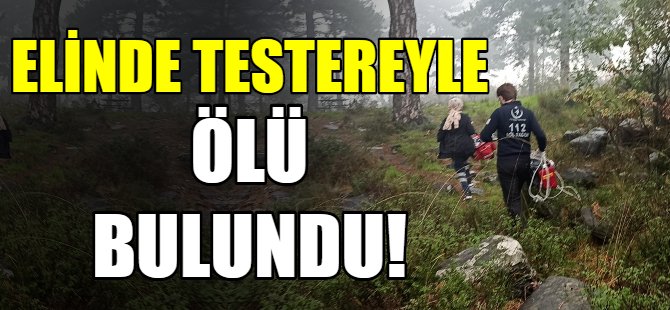 Elinde testere ile ölü bulundu