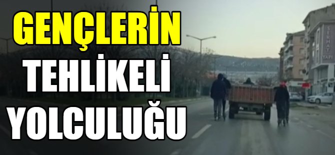 Traktör arkasında tehlikeli yolculuk