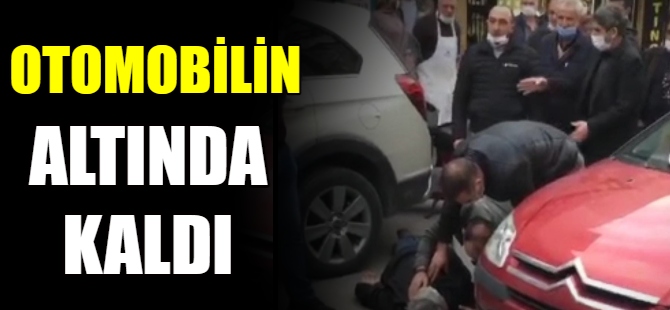 Otomobilin altında kaldı