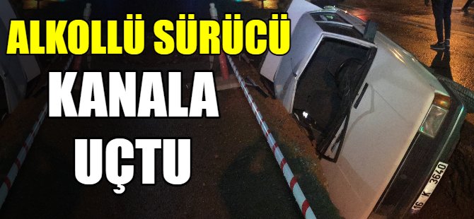 Otomobille kanala uçtu