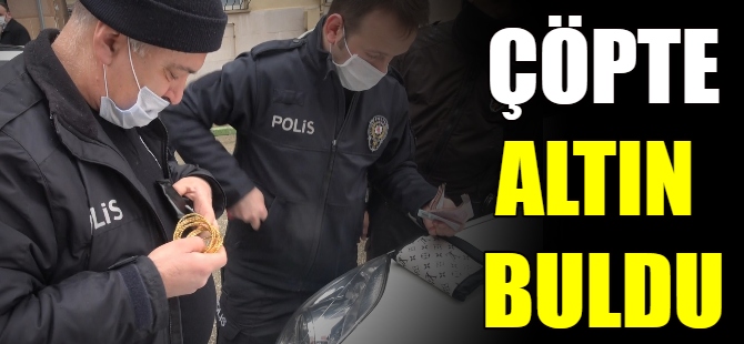 Çöpte, altın dolu çanta buldu