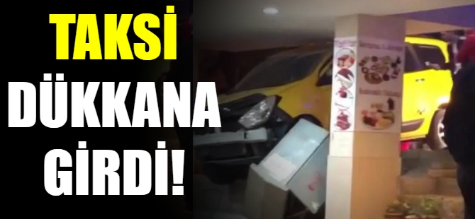 Kontrolden çıkan taksi, dükkana girdi!