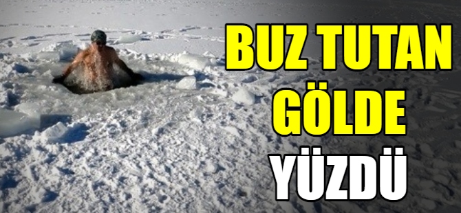 Buz tutan gölde yüzdü
