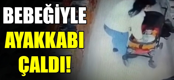 Bebeği ile ayakkabı çaldı