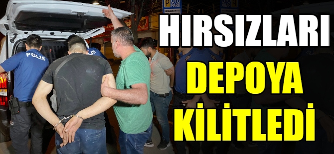 Hırsızları depoya  kilitledi