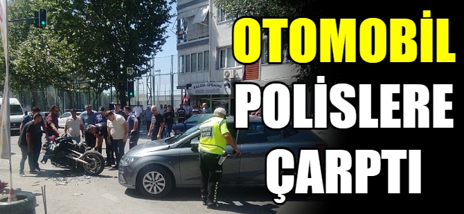 Otomobil polislere çarptı