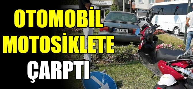 Otomobil, motosiklete çarpıp refüje çıktı