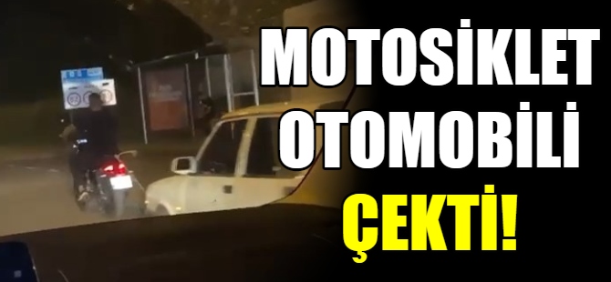 Motosiklet otomobili çekti