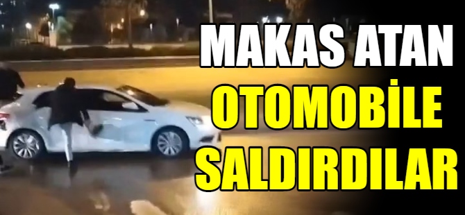 Makas atan otomobile saldırdılar