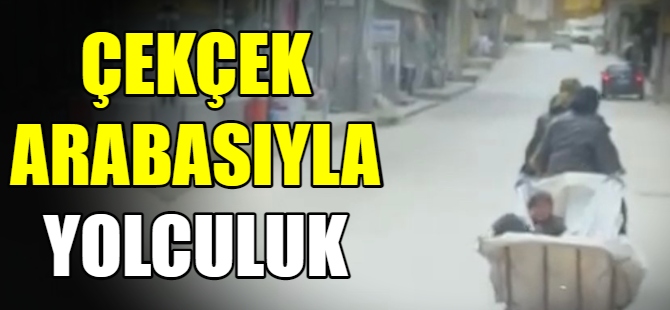 Çekçek arabasıyla çocuk taşıdı