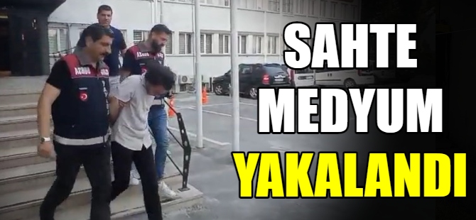 Sahte medyum yakayı ele verdi