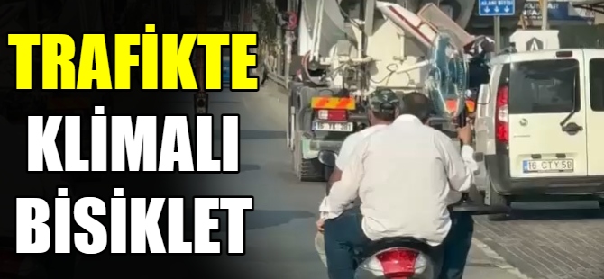 Trafikte klimalı bisiklet