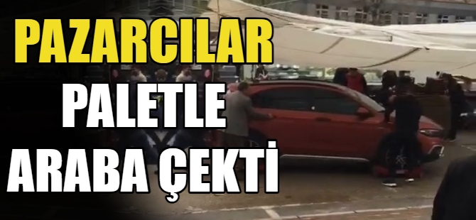 Pazarcılar paletle araba çekti