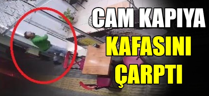 Cam kapıya kafasını çarptı