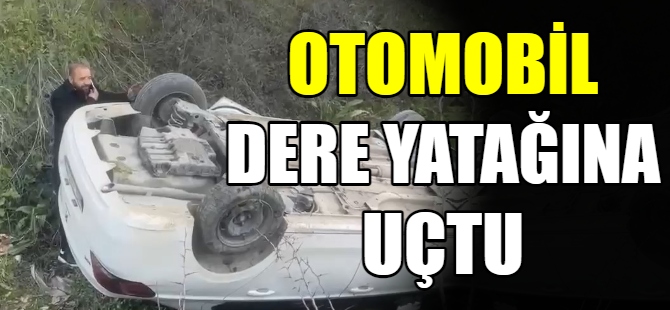 Otomobil dere yatağına uçtu