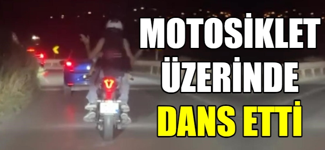 Motosiklet üzerinde dans etti