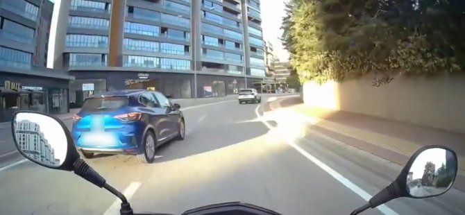 Bursa'da motosikletliyle otomobil şoförünün kavgası kamerada