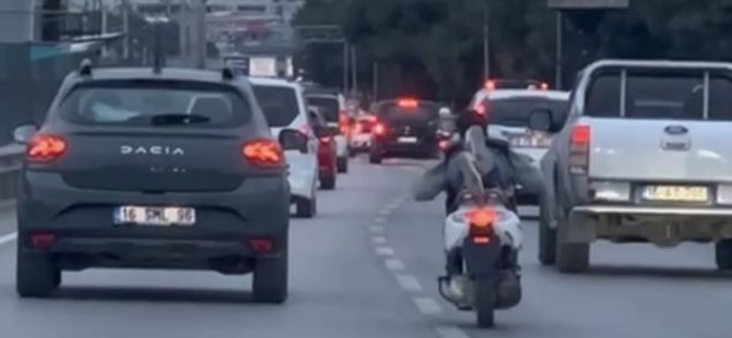 Bursa'da trafikte tehlikeli sürüş! Bir maganda daha kamerada
