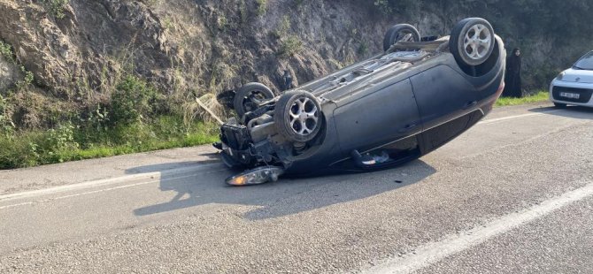 Bursa'da kayalara çarpan otomobil takla attı