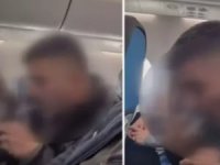 Uçakta sigara yakıp kamerayı açtı!