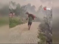 Kurtardığı keçiyi sırtında taşıdı