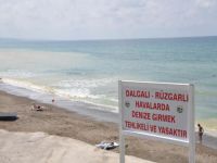 Boğulma olayları üzerine plaja uyarıcı levha konuldu