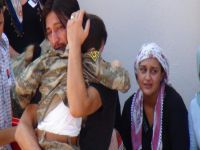 Babasının fotoğrafını elinden düşürmedi