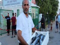 Hatay’da Suriyelilere balık yardımı!